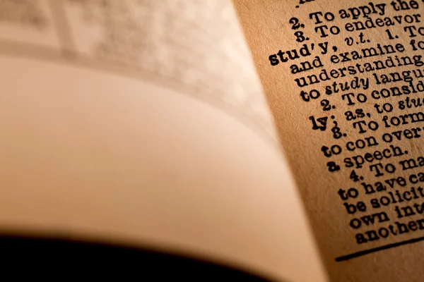 Close-up of an Opened Dictionary showing the Word Study — Stock Photo, Image