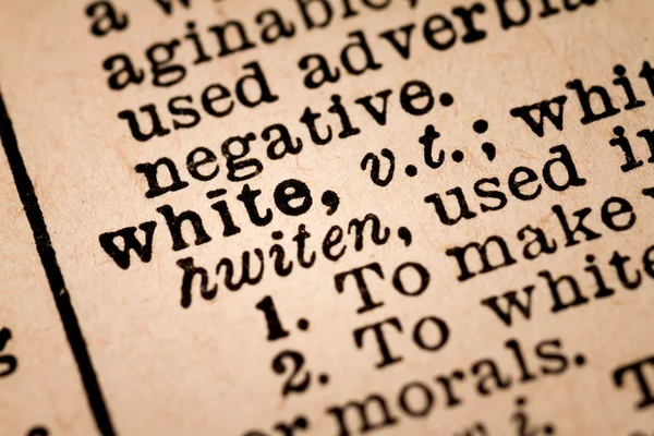 Close-up of an Opened Dictionary showing the Word WHITE — 图库照片