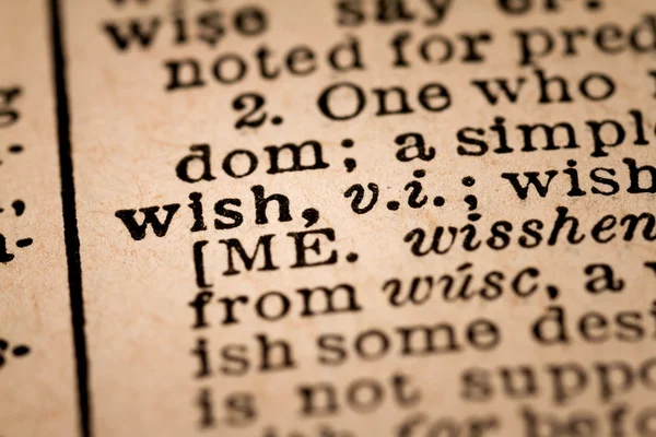 Close-up of an Opened Dictionary showing the Word WISH