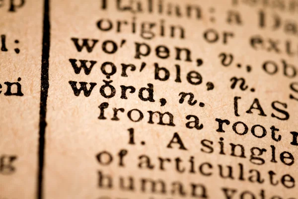 Primer plano de un diccionario abierto que muestra la palabra WORD — Foto de Stock