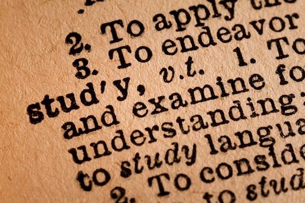 Close-up of an Opened Dictionary showing the Word STUDY — Stock Photo, Image