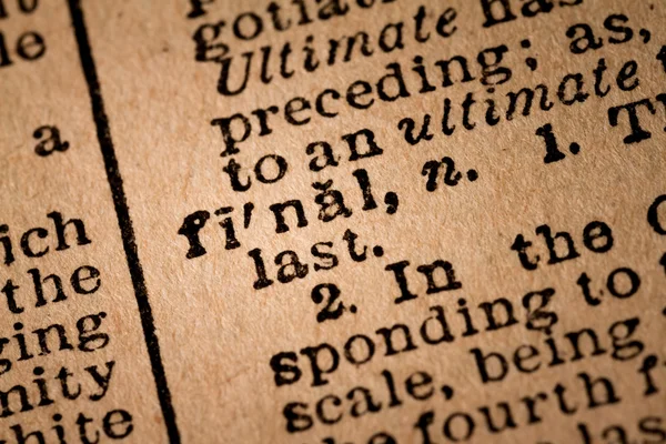 Close-up of an Opened Dictionary showing the Word FINAL — Stock Photo, Image