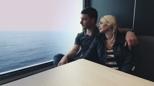 Young Couple Enjoying the Travel on a Boat with the Ocean in Background — Stock Video