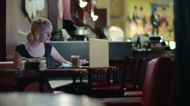 Woman Working Late in a Cafe — Stock Video