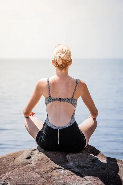 Woman doing Lotus Yoga Position — Stock Photo, Image