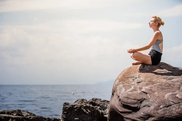 Woman doing Lotus Yoga Position — Stock Photo, Image