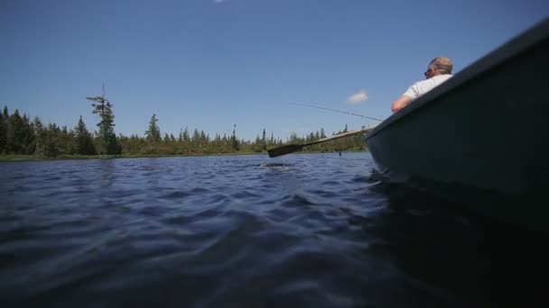 Senior Man Rowing on Small Boat — Stock Video