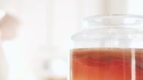 Woman Bringing Sugar and Black Tea for next Batch — Stock Video