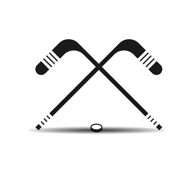 Vector icon hockey sticks and a puck with shadow — Stock Vector