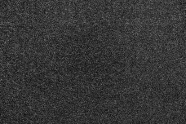Fond monochrome texturé moucheté de tissu de couleur noire — Photo