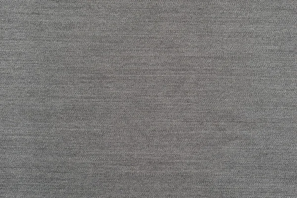 Szorstki tekstura denim tkaniny monochromatyczne tła blady kolor szary — Zdjęcie stockowe