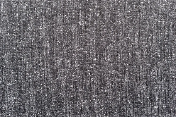 Абстрактная пятнистая текстура из плотной ткани серого цвета — стоковое фото