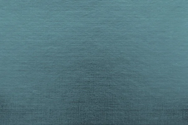 Текстурная ткань или бумага голубого цвета с абстрактной штамповкой — стоковое фото