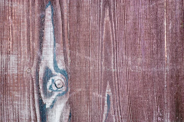Oude textuur van houten gedeelte met een tak — Stockfoto