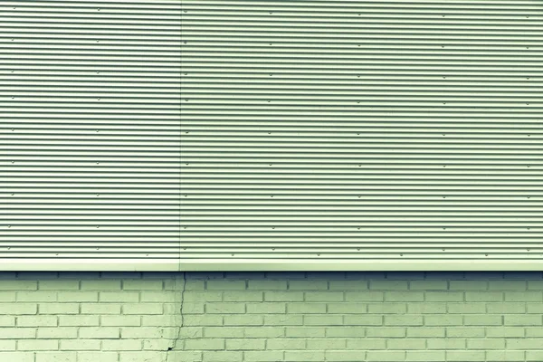 フルーティングを施された鉄とレンガのテクスチャ背景 — ストック写真