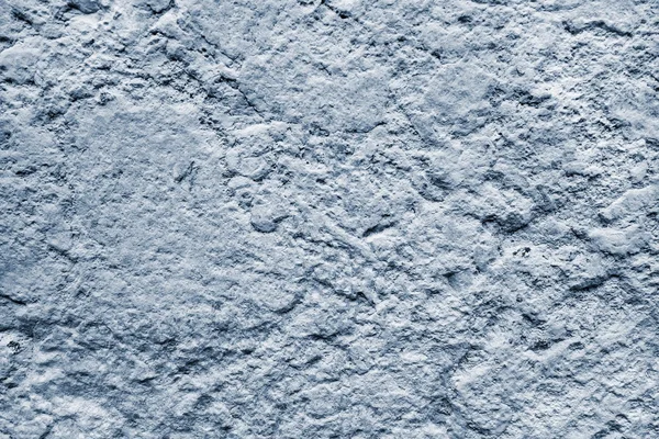 Textura abultada de una superficie de hormigón o piedra color plateado — Foto de Stock