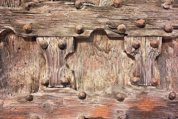 Fragmentaufnahme einer alten Holztür oder eines alten Tores — Stockfoto