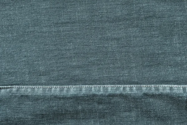 Textura denim con la costura cosida de color índigo pálido — Foto de Stock