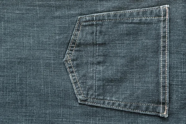 Part jeans clothes with a pocket of pale indigo color — Stock Photo, Image