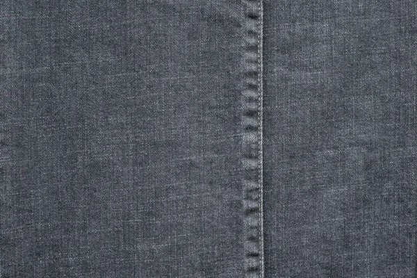 Denim textura com a costura costurada de cor pálida — Fotografia de Stock
