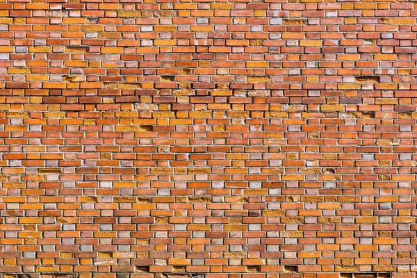 Grov yta av en gammal tegelvägg — Stockfoto