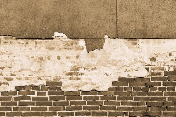 Texture of an old brick wall with destroyed plaster — Stock Photo, Image