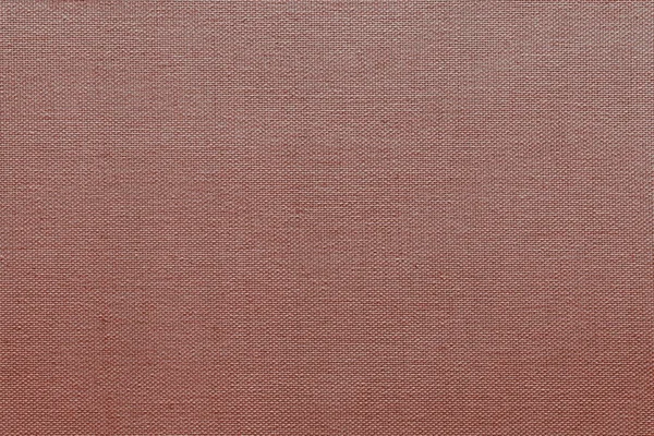 Textuur weven draden van textiel stof rode kleur — Stockfoto