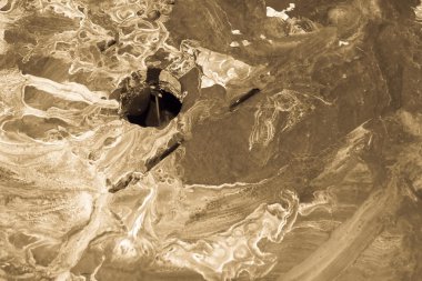 belirsiz sivilceli sepya arka plan delik olan