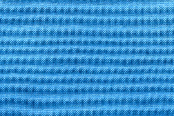Ярко-голубая текстура ткани или текстильного материала — стоковое фото