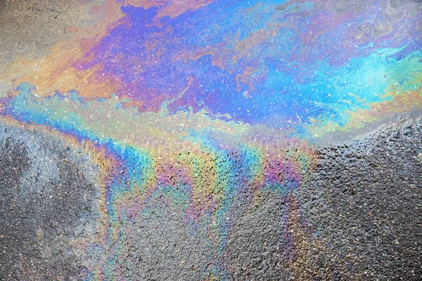 Abstract pattern of an oil or petrol slick — Stock Photo, Image