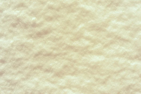 Texture snow surface of bright yellow color — Stock Photo, Image