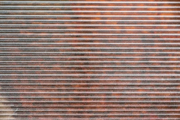 Red-brown fragment of metal blinds — Stock Photo, Image