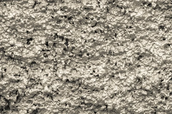 Ухабистые поверхности стен кремового цвета — стоковое фото