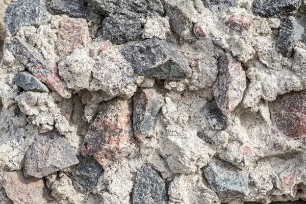 Rough and bumpy texture of a crushed stone — Stock Photo, Image