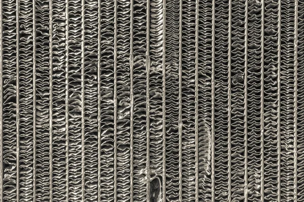 Achtergrond van een oude metalen radiator voor de auto — Stockfoto