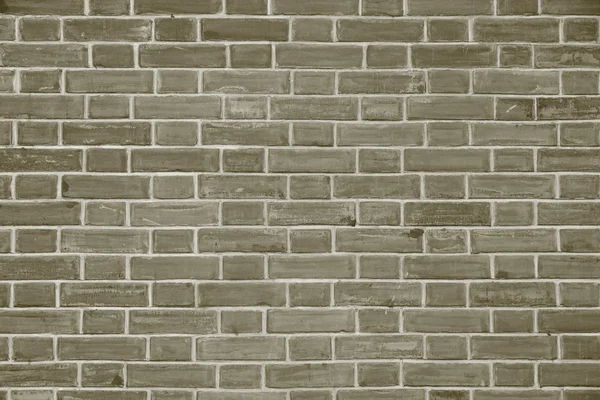 Stone wall from a brick of dirty gray color — Stock Photo, Image