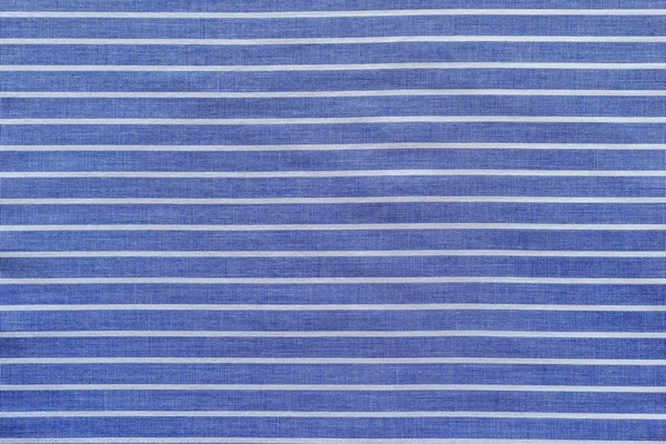 Blau-weiß gestreifte Baumwolle mit körniger Textur — Stockfoto