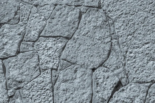 Texture of gray silvery color stone wall with cracks — Stock Photo, Image
