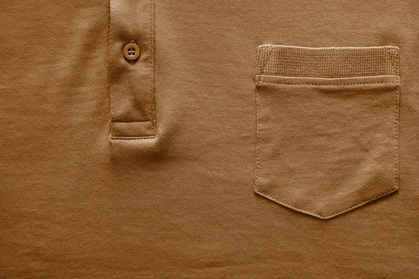 Часть рубашки крупным планом коричневого цвета — стоковое фото