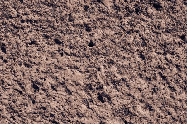 Textura abradante marrom de uma pedra velha — Fotografia de Stock