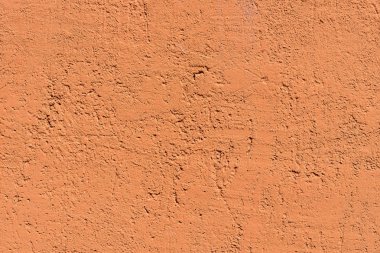 kaba doku turuncu renkteki yüzeyi sıvalı