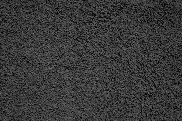 Rough texture plastered surface of black color — Stock Photo, Image