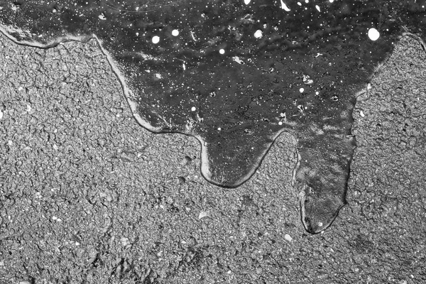 Bitumen abstract form on asphalt of monochrome tone — Stock Photo, Image