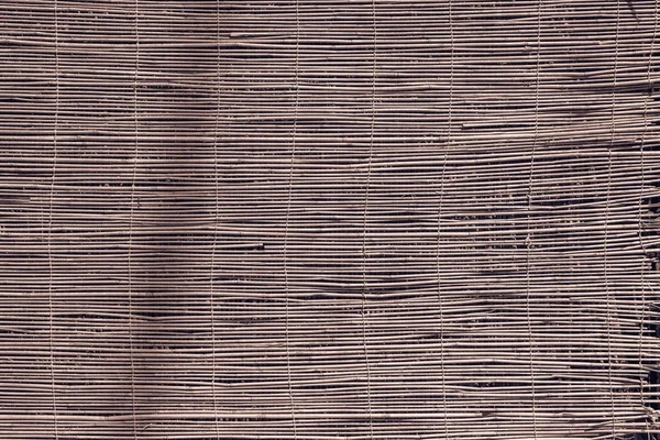 Závěs nebo obrazovky od reed hnědé barvy — Stock fotografie