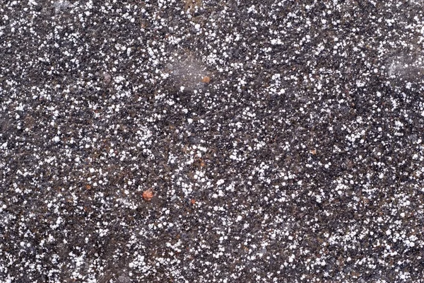 Texture frozen asphalt of dark color — Stock Photo, Image