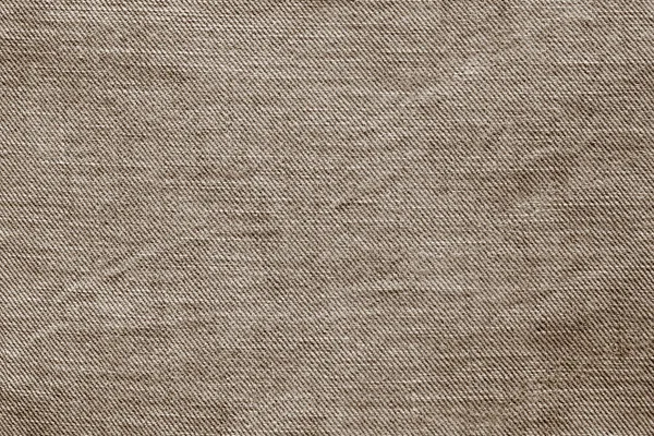 Текстура старые джинсы коричневого цвета — стоковое фото