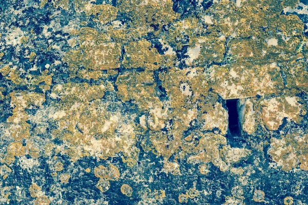 Old abstract texture of a decayed stone surface — Stock Photo, Image