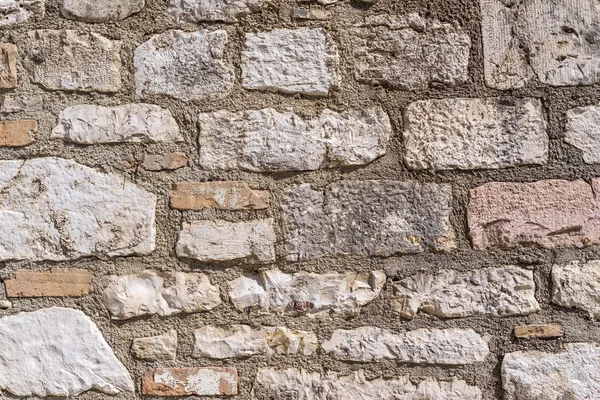 Vintage abstract stone texture of an ancient brick wall — Stock Photo, Image