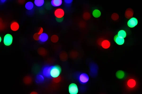 Bunte Weihnachtsbeleuchtung Bokeh Auf Schwarzem Hintergrund — Stockfoto