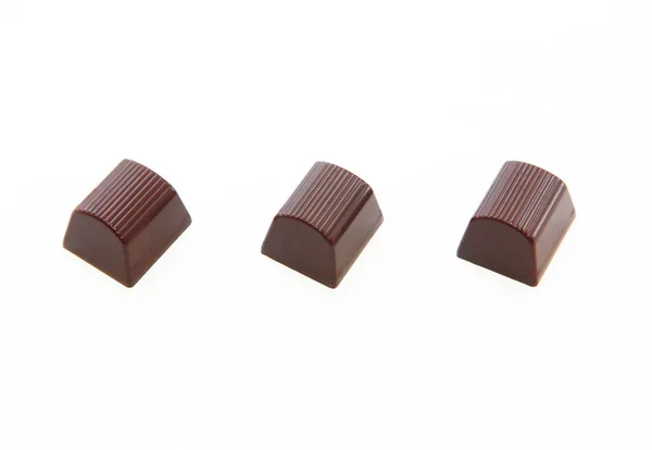 Beyaz Bir Arkaplanı Olan Çikolata Şekerleri — Stok fotoğraf